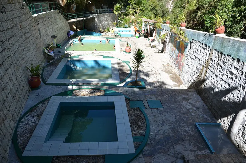 The terraced thermal pools above Aguas Calientes that give the town its name