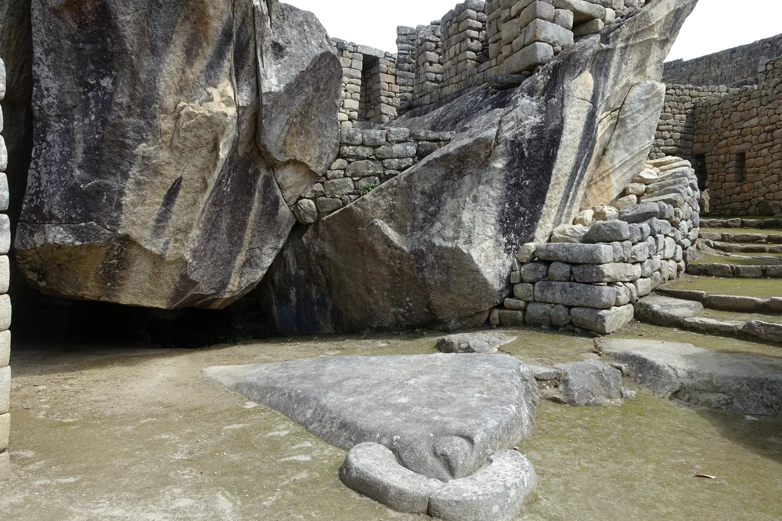 The Temple of the Condor at Machu Picchu, its carved stone forming a condor's head and outstretched wings